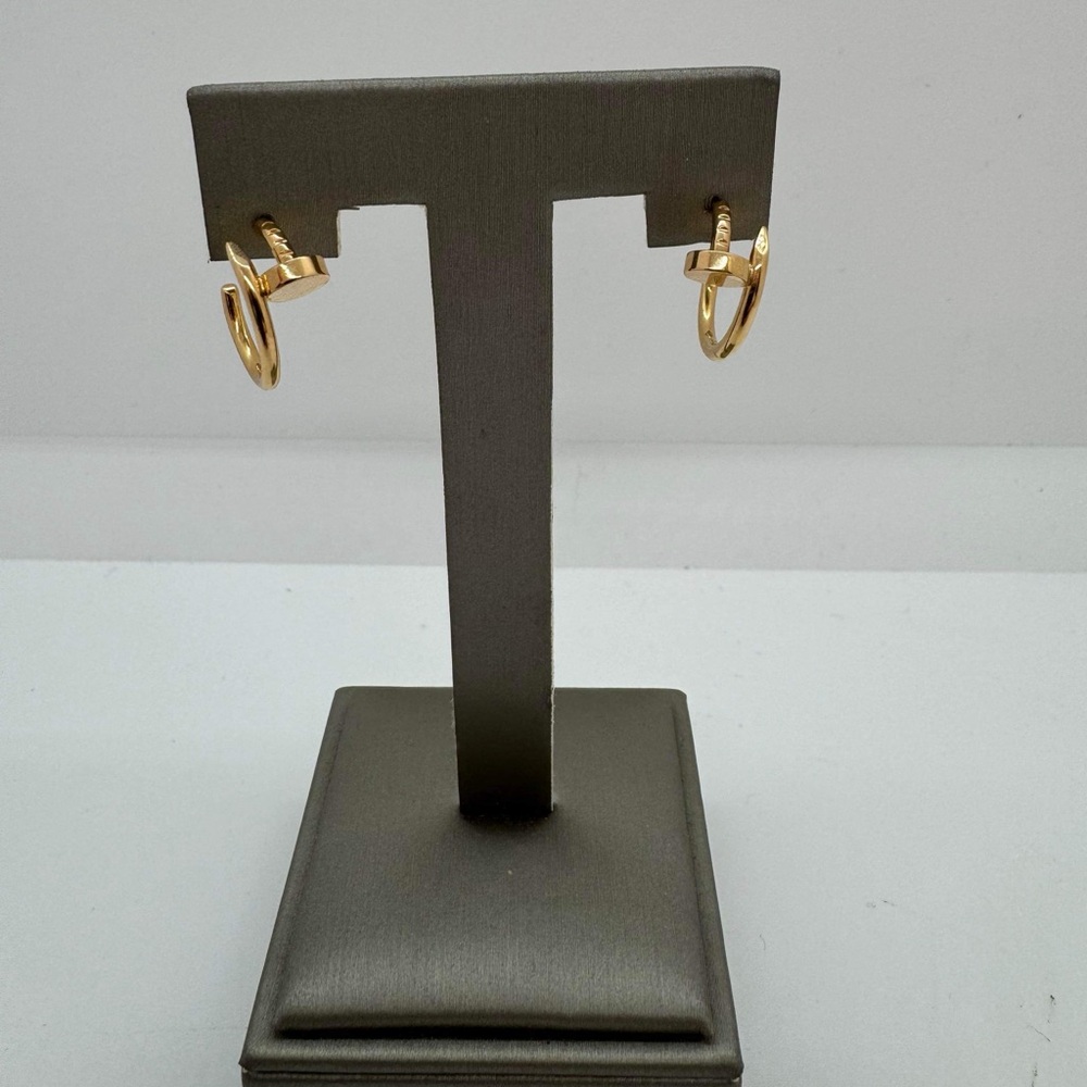 Selling new Cartier earrings, never worn. Comes with box, papers
